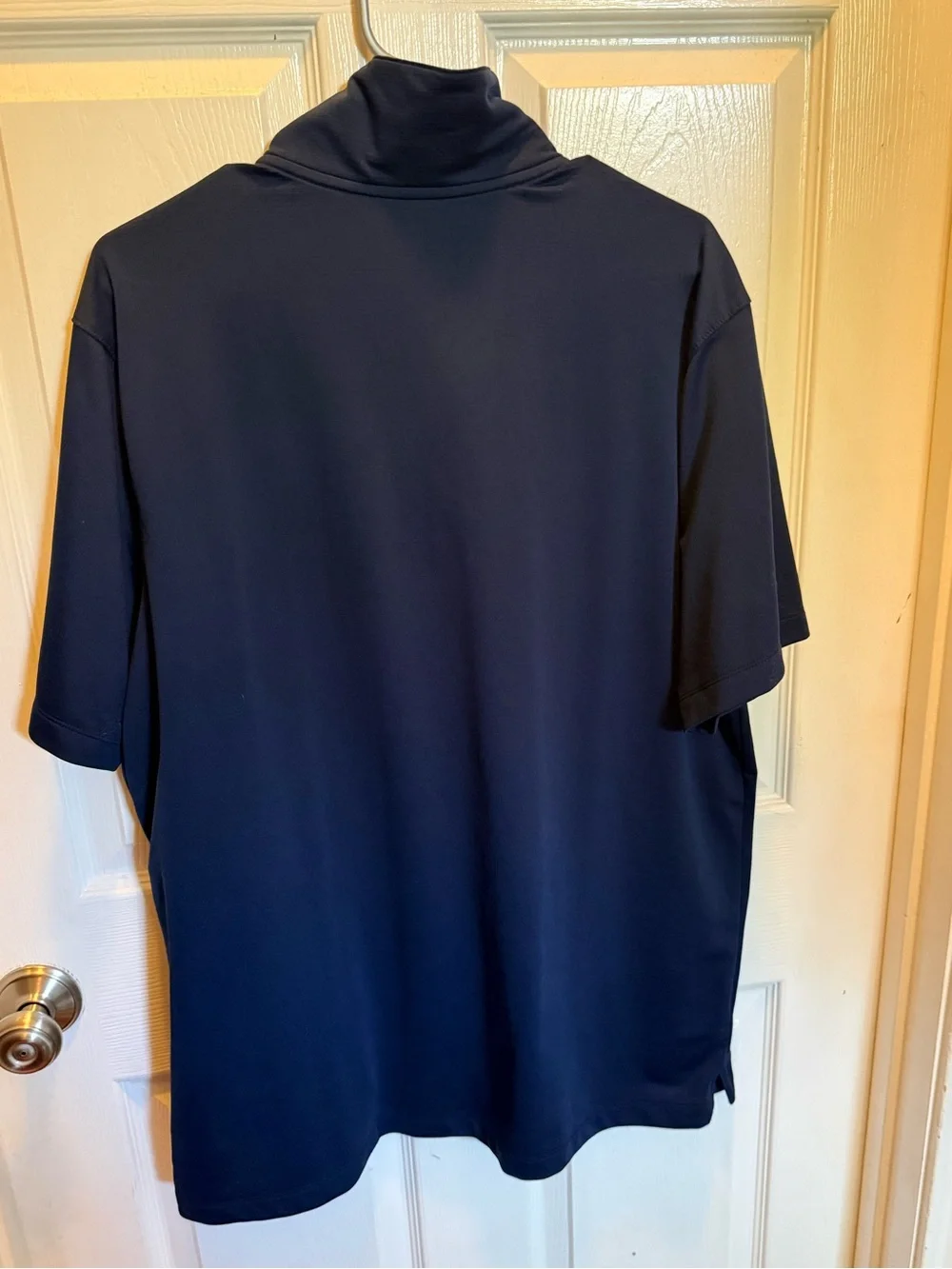 Nike Men's Navy Blue Polo with White Swoosh